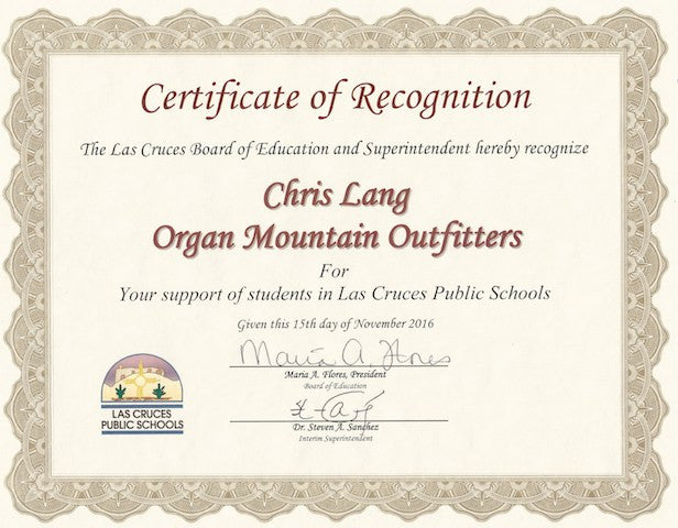 Las Cruces Public Schools presents Organ Mountain Outfitters with a Certificate of Recognition